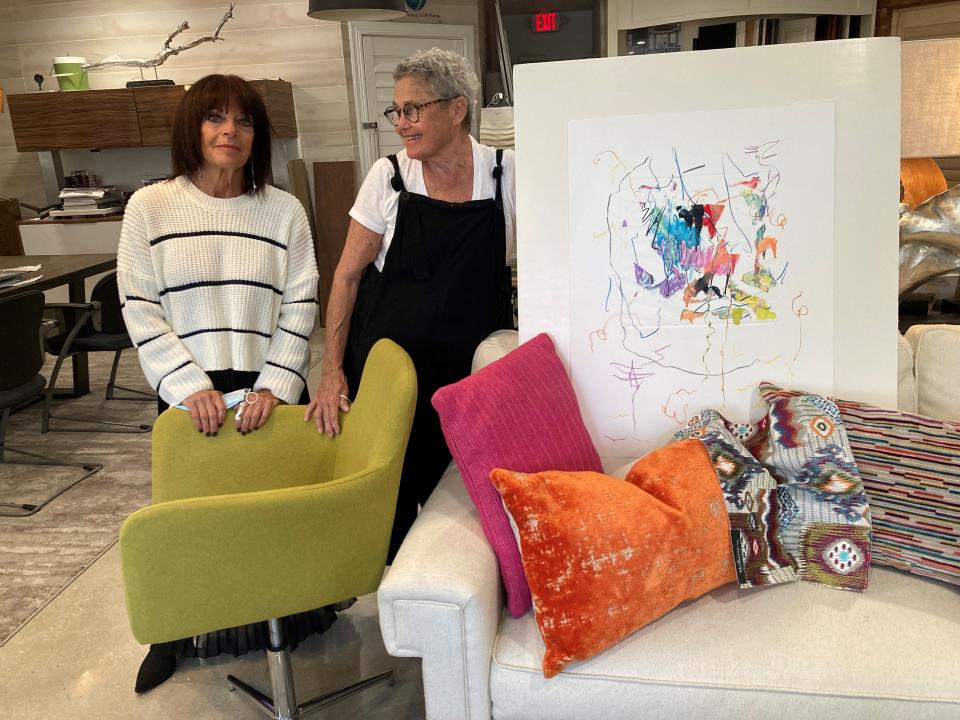 Interior designer Bebe Booskos, left, and artist Tammra Sigler put together one of Sigler's works with prints, fabrics and accessory furniture that worked well together for Art & Design Expo 2021.