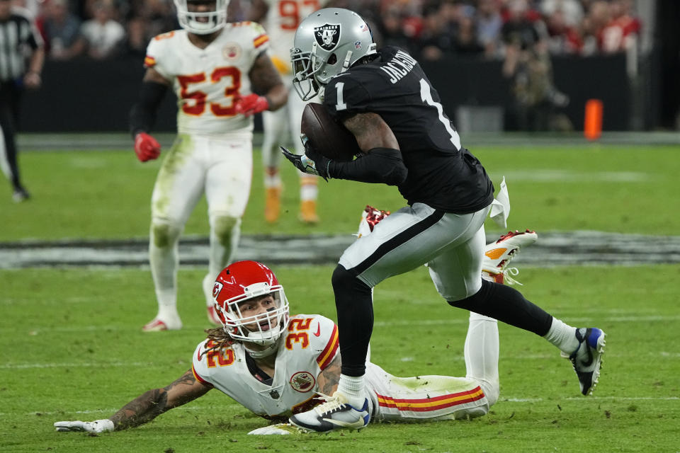 Las Vegas Raiders wide receiver DeSean Jackson (1) catches a pass over Kansas City Chiefs free safety Tyrann Mathieu (32) during the second half of an NFL football game, Sunday, Nov. 14, 2021, in Las Vegas. (AP Photo/Rick Scuteri)