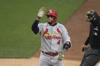 St. Louis Cardinals' Yadier Molina (4) waves after hitting a solo home run during the fourth inning of a baseball game against the San Diego Padres, Saturday, May 15, 2021, in San Diego. (AP Photo/Denis Poroy)