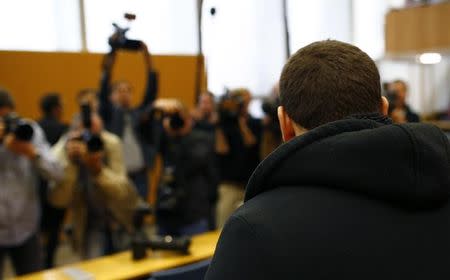 Defendant Kreshnik B., waits for the start of his trial in a courtroom in Frankfurt September 15, 2014. REUTERS/Ralph Orlowski