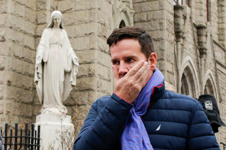 Chilean victim of clerical sexual abuse Juan Cruz reacts on the street after meeting with investigator, Archbishop Charles Scicluna of Malta in New York City, New York, U.S., February 17, 2018. REUTERS/Eduardo Munoz