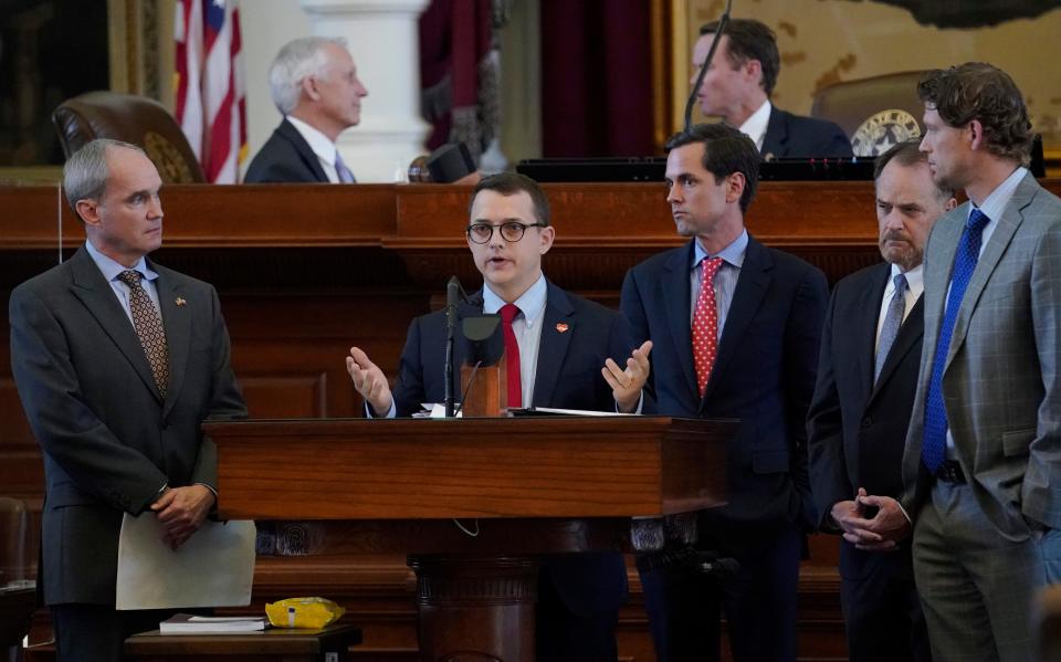 State Rep. Briscoe Cain speaks in support of a restrictive voting bill in the House Chamber at the Capitol in Austin, Texas, on May 6, 2021.
