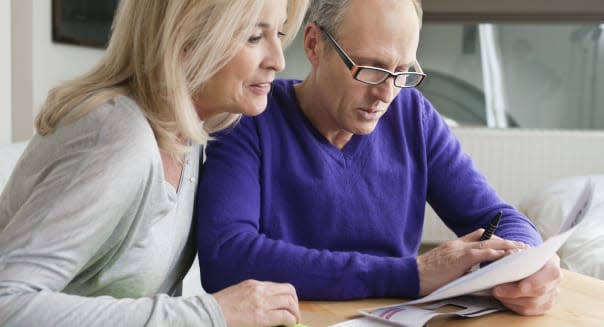 Couple sorting out bills