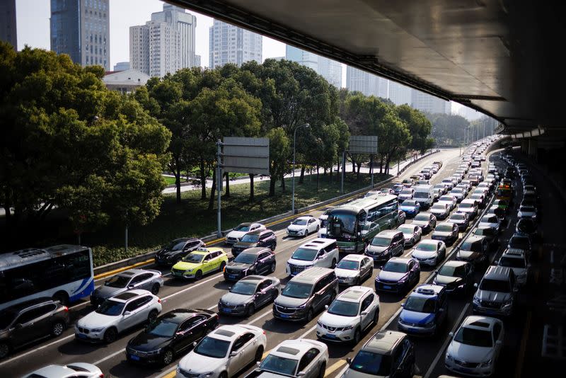 Cars wait in traffic in Shanghai