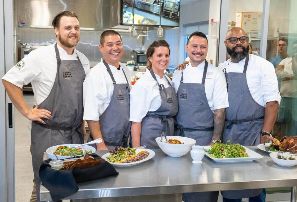 From left, chefs Sean Rumery of Canon East Sacramento, Craig Takehara of Binchoyaki Izakaya Dining, Rebecca Campbell of Sac City Brews and Nourish Event Kitchen, Derek Sawyer of Allora and Dennis Sydnor of Renegade Dining and Cafe Federico stand on Monday, Aug. 7, 2023, with a preview of the meal for the Tower Bridge Dinner.