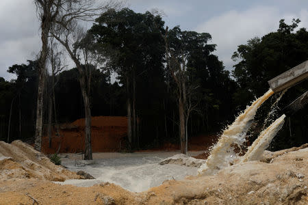 An illegal cassiterite mine is seen during an operation conducted by agents of the Brazilian Institute for the Environment and Renewable Natural Resources, or Ibama, in national parks near Novo Progresso, southeast of Para state, Brazil, November 4, 2018. REUTERS/Ricardo Moraes