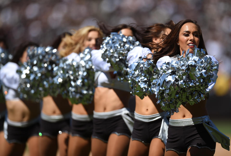 The then-Oakland Raiders settled with nearly 100 women who worked as Raiderette cheerleaders as part of a lawsuit over working conditions. (Photo by Thearon W. Henderson/Getty Images)