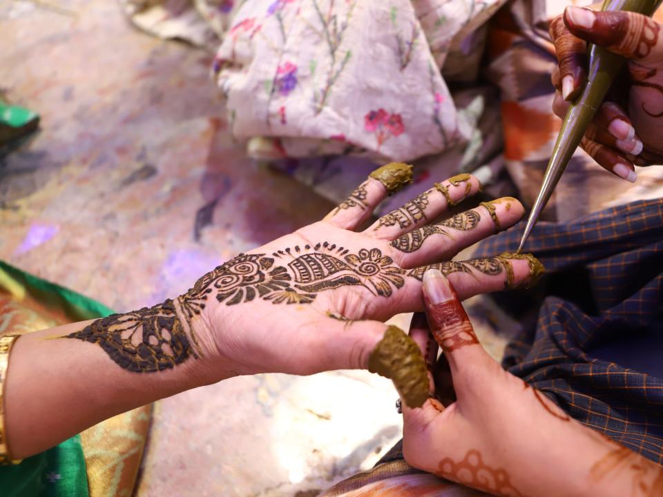 A picture of henna being applied