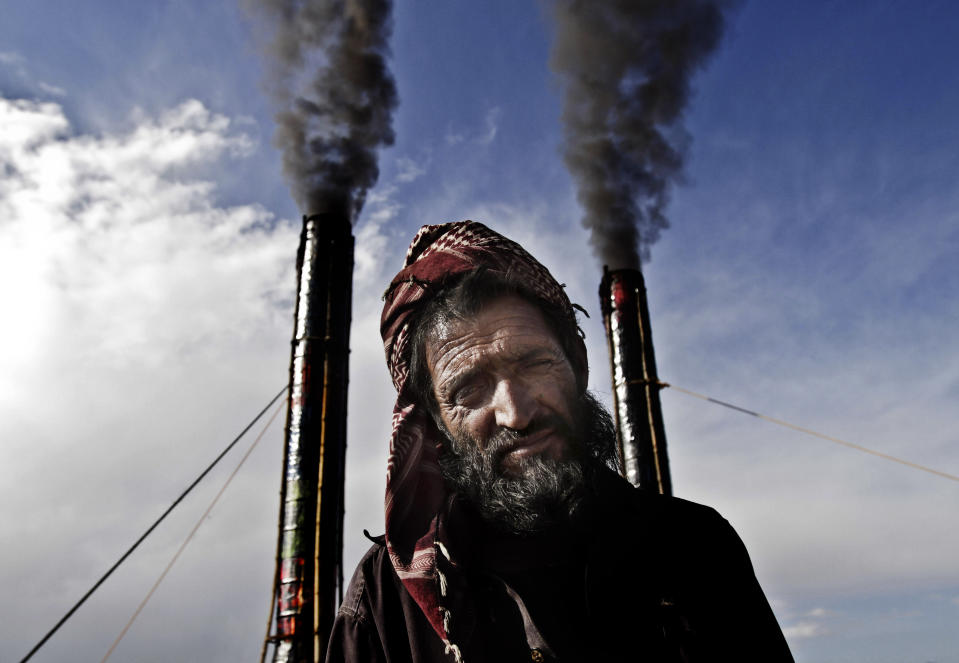 AP10ThingsToSee - An elderly Afghan laborer works at a local brick factory on the outskirts of Kabul, Afghanistan, Sunday, April 28, 2013. (AP Photo/Rahmat Gul, File)