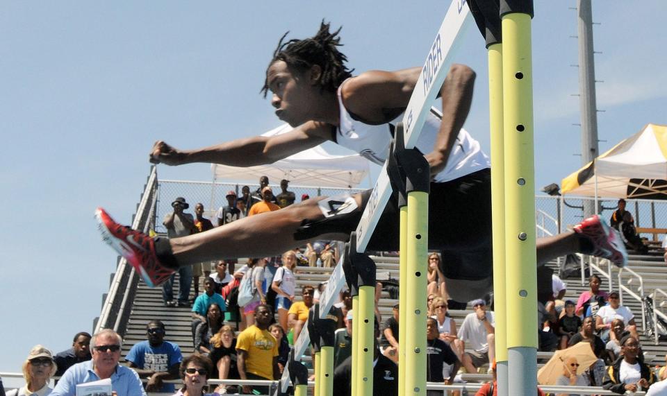 Charles Wulff of Hodgson winning the division 2 boys 100 meter hurdles at the state meet in 2012.