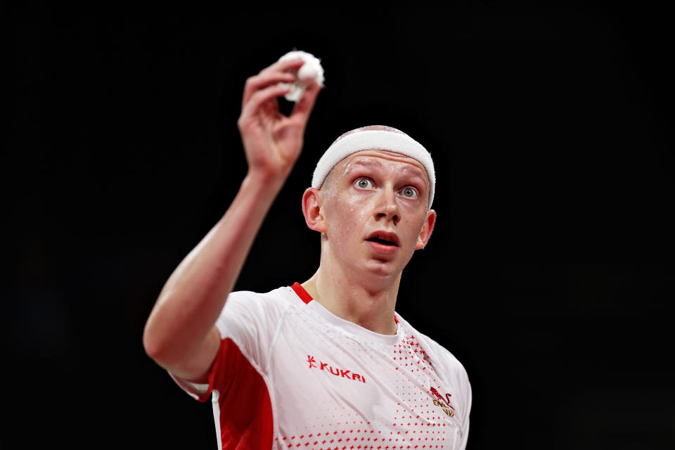 BIRMINGHAM, ENGLAND - AUGUST 04: Toby Penty of Team England reacts during their Badminton Men's Singles Round of 32 match against Nathan Tang of Team Australia on day seven of the Birmingham 2022 Commonwealth Games at NEC Arena on August 04, 2022 in Birmingham, England. (Photo by Dean Mouhtaropoulos/Getty Images)