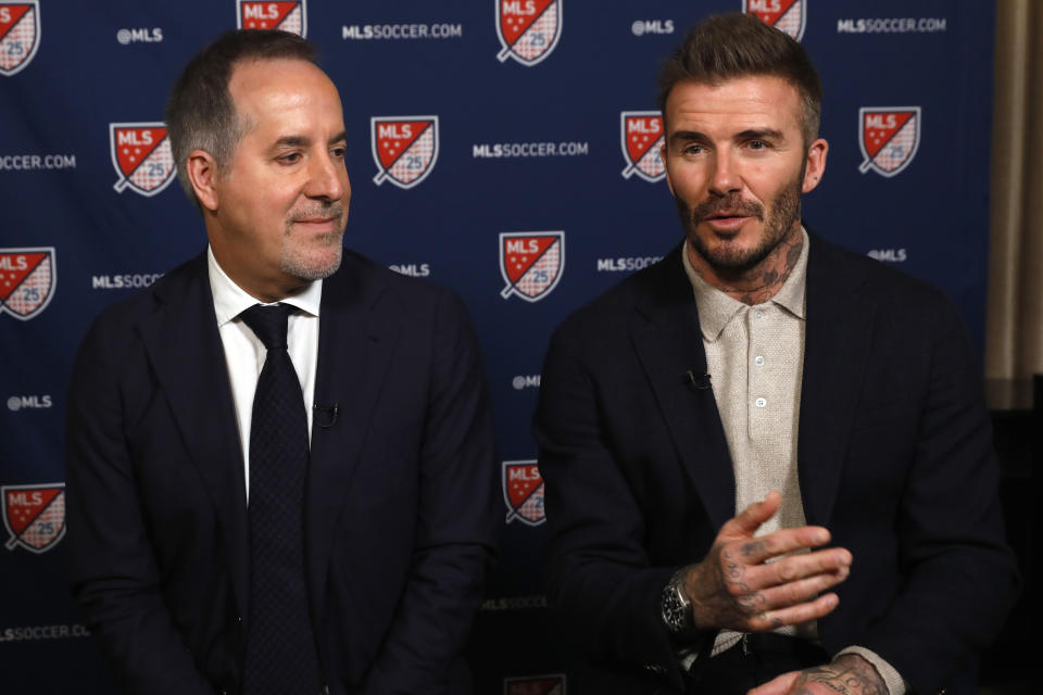 Inter Miami CF co-owners Jorge Mas, left, and David Beckham, are interviewed during the Major League Soccer 25th Season kickoff event, in New York, Wednesday, Feb. 26, 2020. (AP Photo/Richard Drew)