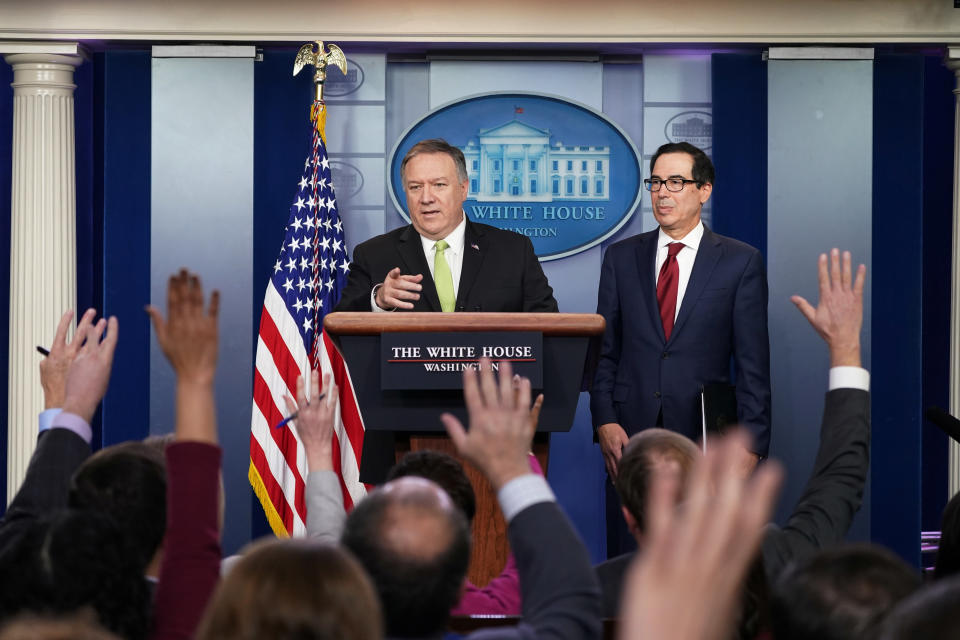U.S. Secretary of State Mike Pompeo and Treasury Secretary Steven Mnuchin announce new sanctions on Iran in the Brady Press Briefing Room of the White House in Washington, U.S., January 10, 2020. REUTERS/Kevin Lamarque