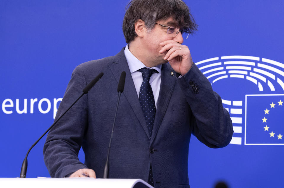 Former Catalan leader Carles Puigdemont speaks during a media conference at the European Parliament in Brussels, Wednesday Feb. 24, 2021. A key European Parliament committee voted Tuesday to lift the immunity of three former top Catalan officials who fled Spain fearing arrest over a secessionist push they led in the region, possibly paving the way for their extradition. (AP Photo/Olivier Matthys)