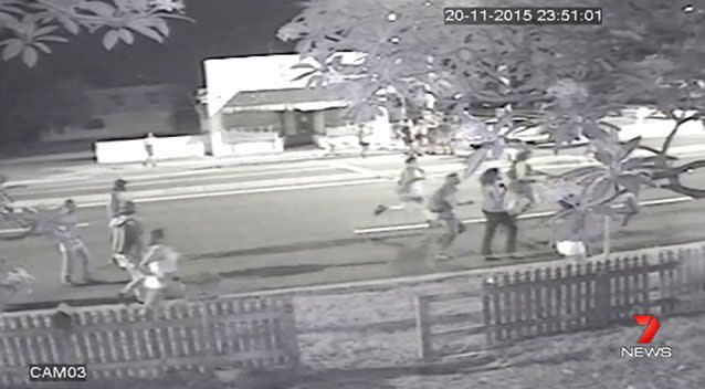 The offenders running down the street. Source: 7 News.