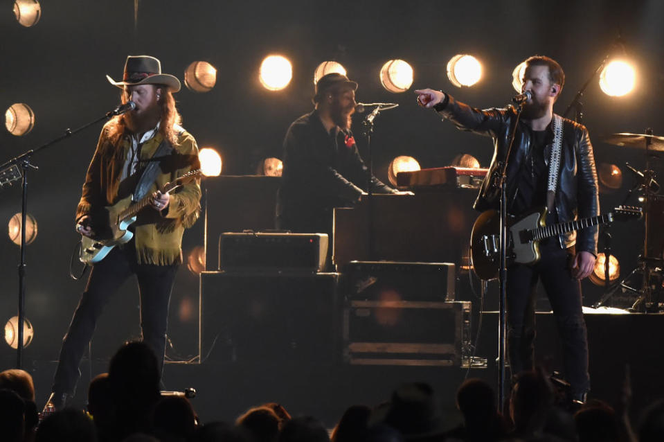 <p>John Osborne and T.J. Osborne of Brothers Osborne perform onstage at the 51st annual CMA Awards at the Bridgestone Arena on November 8, 2017 in Nashville, Tennessee. (Photo by Rick Diamond/Getty Images) </p>