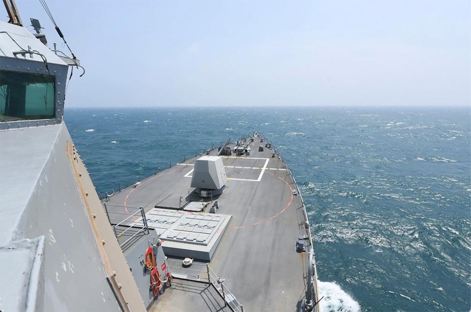 In this photo provided by the U.S. Navy, the Arleigh Burke-class guided-missile destroyer USS Halsey (DDG 97) conducts routine underway operations while transiting through the Taiwan Strait (AP)