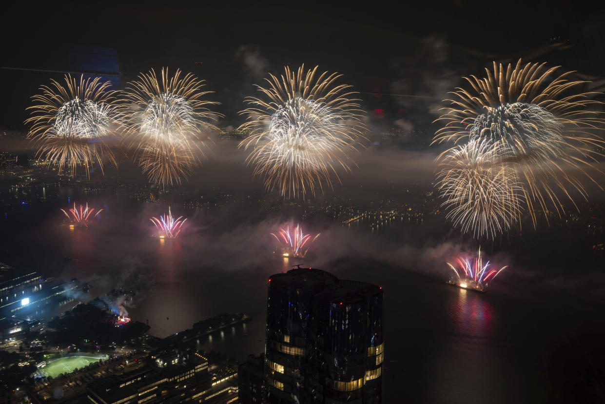 Fireworks go off in the sky above the Hudson River during the Macy's 4th of July Fireworks show, as seen from atop the Edge at Hudson Yards in Manhattan.