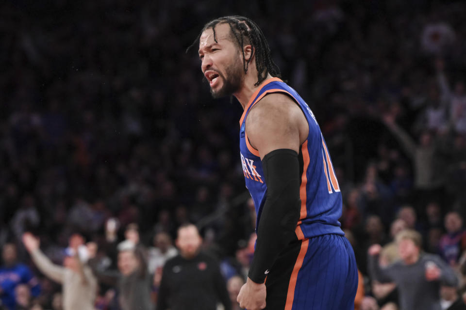 New York Knicks guard Jalen Brunson (11) reacts after making a basket and being fouled during the second half of the team's NBA basketball In-Season Tournament game against the Miami Heat, Friday, Nov. 24, 2023, in New York. (AP Photo/John Jones)