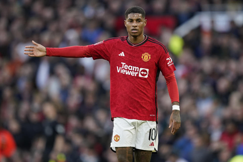 Manchester United's Marcus Rashford gestures during the FA Cup quarterfinal soccer match between Manchester United and Liverpool at the Old Trafford stadium in Manchester, England, Sunday, March 17, 2024. (AP Photo/Dave Thompson)