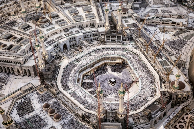 Muslim worshippers are gathering at the Kaaba, Islam's holiest shrine, at the Grand Mosque in Mecca (FADEL SENNA)