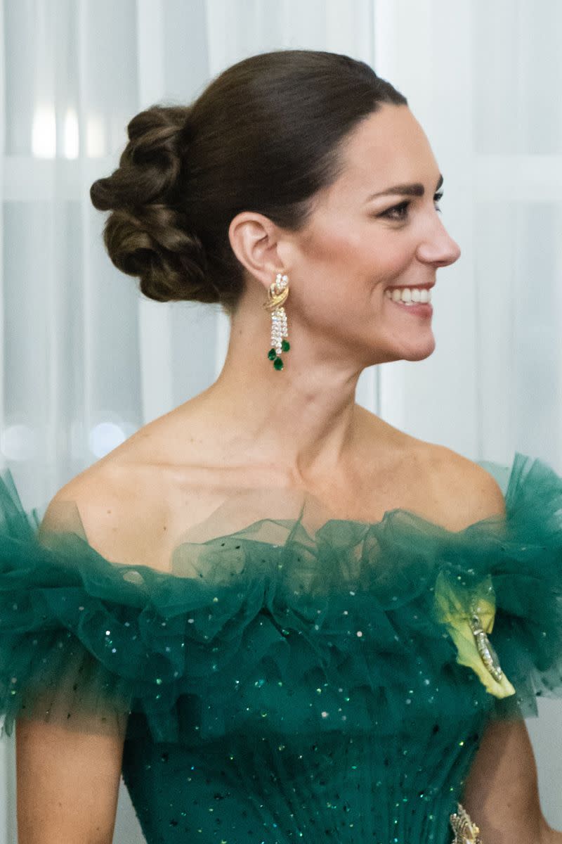 Kate Middleton headshot with a braided bun hairstyle