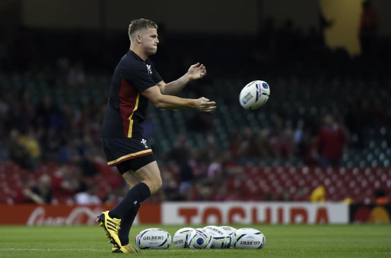 Wales' full-back Gareth Anscombe takes part in warm up prior to a Pool A match of the 2015 Rugby World Cup between Wales and Fiji at the Millennium stadium in Cardiff, south Wales, on October 1, 2015