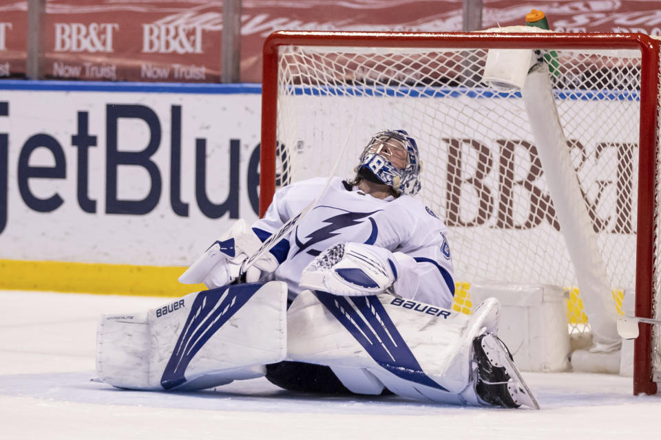 Tampa Bay Lightning goaltender Andrei Vasilevskiy (88) reacts after allowing a fourth goal by the Florida Panthers during the second period of an NHL hockey game on Saturday, May 8, 2021, in Sunrise, Fla. (AP Photo/Mary Holt)