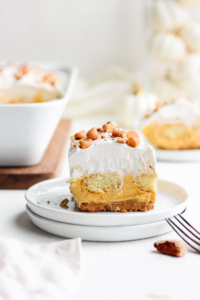 <p>Layer pumpkin mousse, ladyfingers, and whipped topping to create this lasagna-inspired masterpiece.</p><p><strong>Get the recipe at <a href="https://www.thecookierookie.com/pumpkin-pie-dessert-lasagna/" rel="nofollow noopener" target="_blank" data-ylk="slk:The Cookie Rookie;elm:context_link;itc:0;sec:content-canvas" class="link ">The Cookie Rookie</a>.</strong> </p>