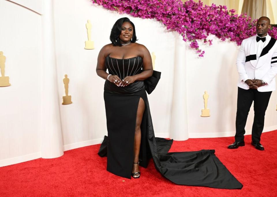 Danielle Brooks and Dennis Gelin arrive at the 96th Academy Awards.