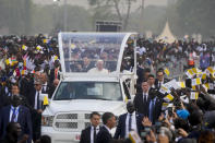 Pope Francis arrives to celebrate mass at the John Garang Mausoleum in Juba, South Sudan, Sunday, Feb. 5, 2023. Francis is in South Sudan on the second leg of a six-day trip that started in Congo, hoping to bring comfort and encouragement to two countries that have been riven by poverty, conflicts and what he calls a "colonialist mentality" that has exploited Africa for centuries. (AP Photo/Gregorio Borgia)