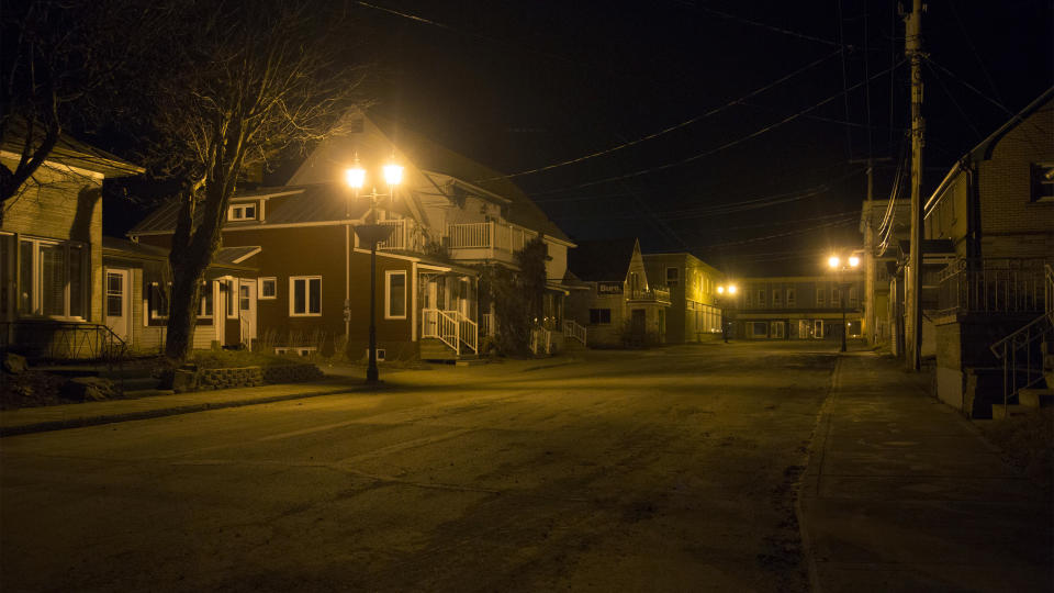 Rue Thibodeau in the downtown business core of Lac-Megantic becomes a ghost town after most of the construction workers leave the restricted entry red zone. Residents and shop owners are not permitted inside the red zone on Nov. 19, 2013. (Chris So/Toronto Star via Getty Images)