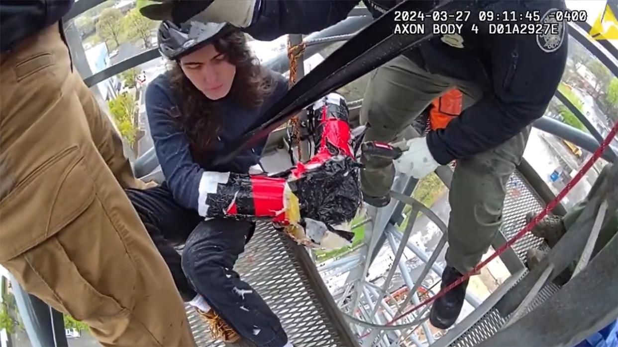 Atlanta tower crane male protester cut free