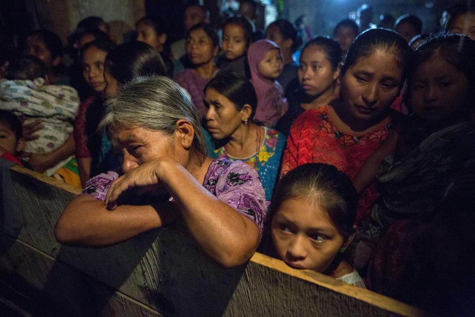 Elvira Choc grieves as she attends a memorial service for her 7-year-old granddaughter Jakelin Caal Maquin, in San Antonio Secortez, Guatemala, Monday, Dec. 24, 2018. The body of the 7-year-old girl who died while in the custody of the U.S. Border Patrol was handed over to family members in her native Guatemala on Monday for a last goodbye. (AP Photo/ Oliver de Ros)