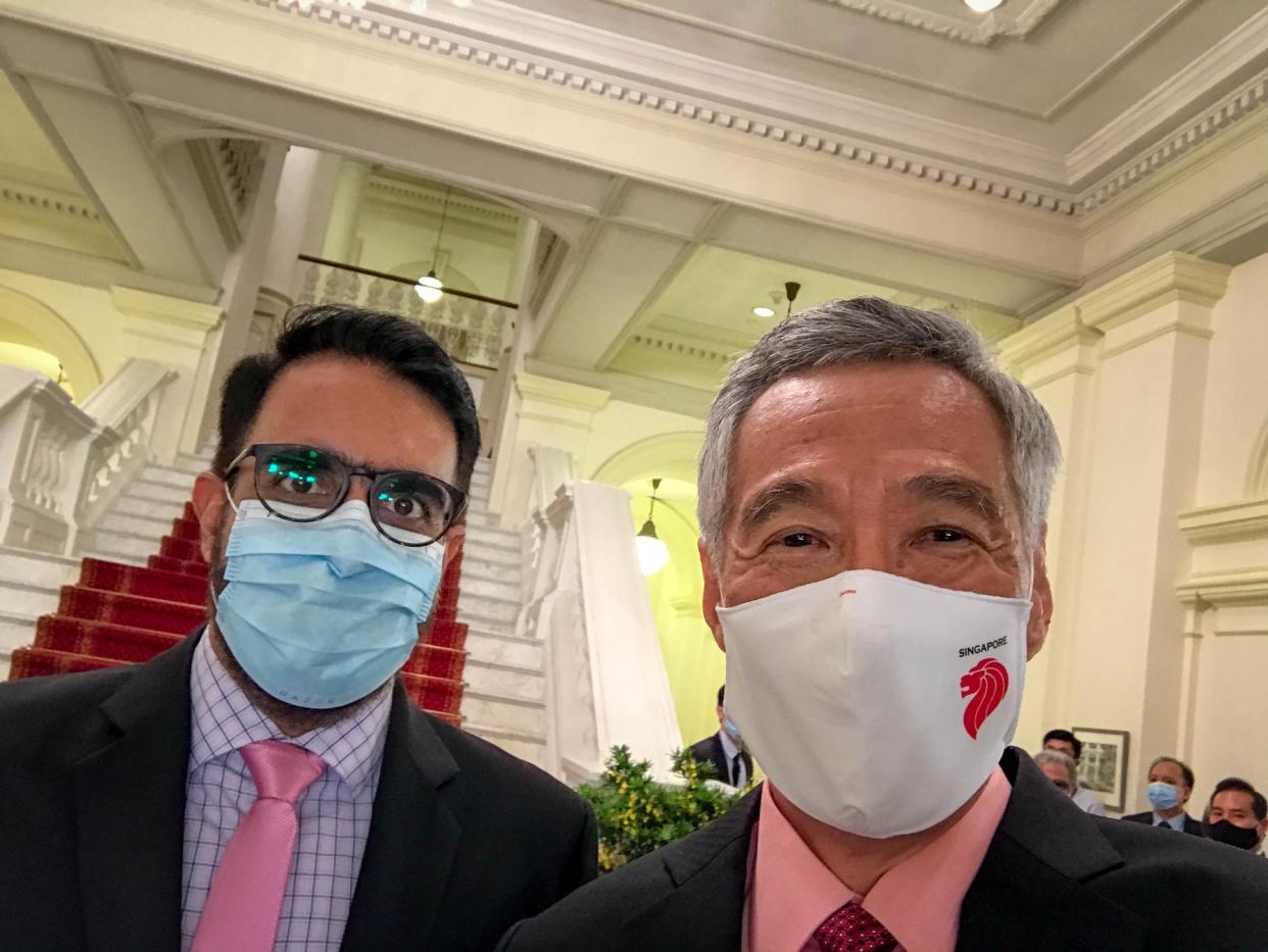 Workers' Party chief Pritam Singh and Prime Minister Lee Hsien Loong at the swearing in ceremony at the Istana on 27 July 2020. (PHOTO: Lee Hsien Loong/Facebook)
