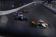 Felix Rosenqvist, of Sweden, heads into the first turn during the final practice for the Indianapolis 500 auto race at Indianapolis Motor Speedway in Indianapolis, Friday, May 26, 2023. (AP Photo/Michael Conroy)