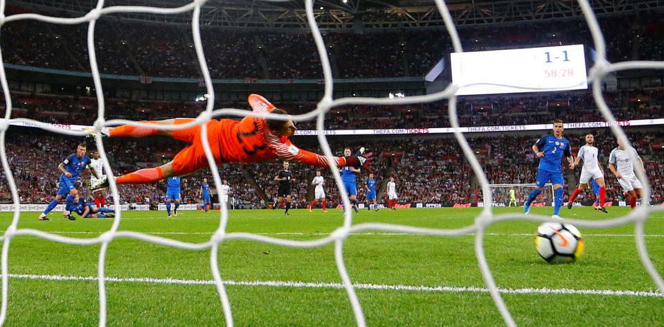 <p>Soccer Football – 2018 World Cup Qualifications – Europe – England vs Slovakia – London, Britain – September 4, 2017 England’s Marcus Rashford (L) scores their second goal past Slovakia’s Martin Dubravka REUTERS/Darren Staples </p>