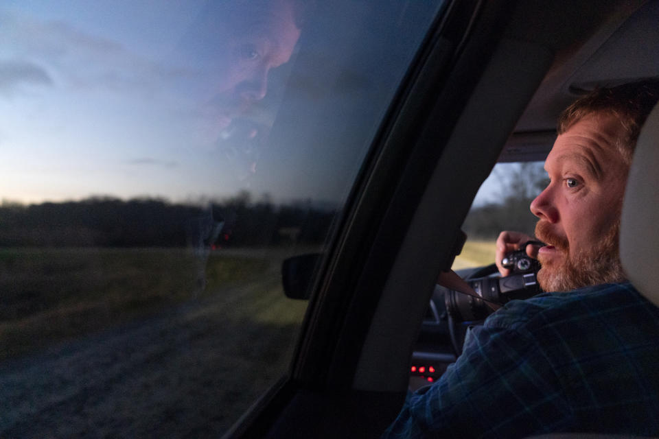 Ron Sutherland, a biologist with the Wildlands Network, looks for red wolves, the only wolf species found solely in the United States, on the Alligator River National Wildlife Refuge, Thursday, March 23, 2023, near Manns Harbor, N.C. Once declared extinct in the wild, the wolves were reintroduced in the late 1980s on the refuge near North Carolina's Outer Banks. Over the next quarter century, it became a poster child for the Endangered Species Act, and a model for efforts to bring back other species. (AP Photo/David Goldman)