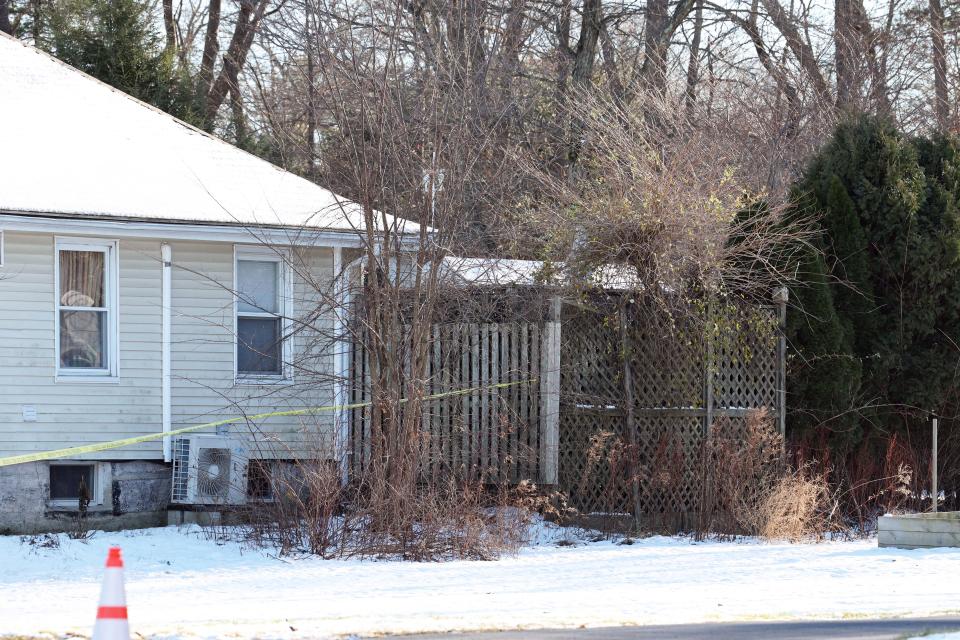 The Stoughton Police Department and State Police detectives assigned to the Norfolk County district attorney's office investigate a homicide after a woman's body was discovered in an outbuilding at 743 Park St. in Stoughton on Tuesday, Dec. 13, 2022.