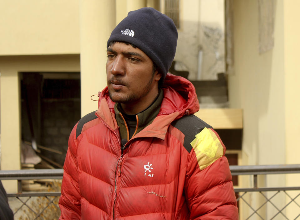 Sajid Ali Sadpara, son of Pakistani missing mountain climber Ali Sadpara, who had begun the climb with his father but was forced to abandon the summit attempt after his equipment failed, talks to local journalists at his house in Skardu, a town in the Gilgit-Baltistan region of northern Pakistan, Monday, Feb. 8, 2021. Families of the three mountaineers who went missing in Pakistan last week while attempting to scale K2, the world's second-highest mountain, were growing more desperate on Tuesday, a day after bad weather halted the search for the climbers. (AP Photo/M.H. Balti)