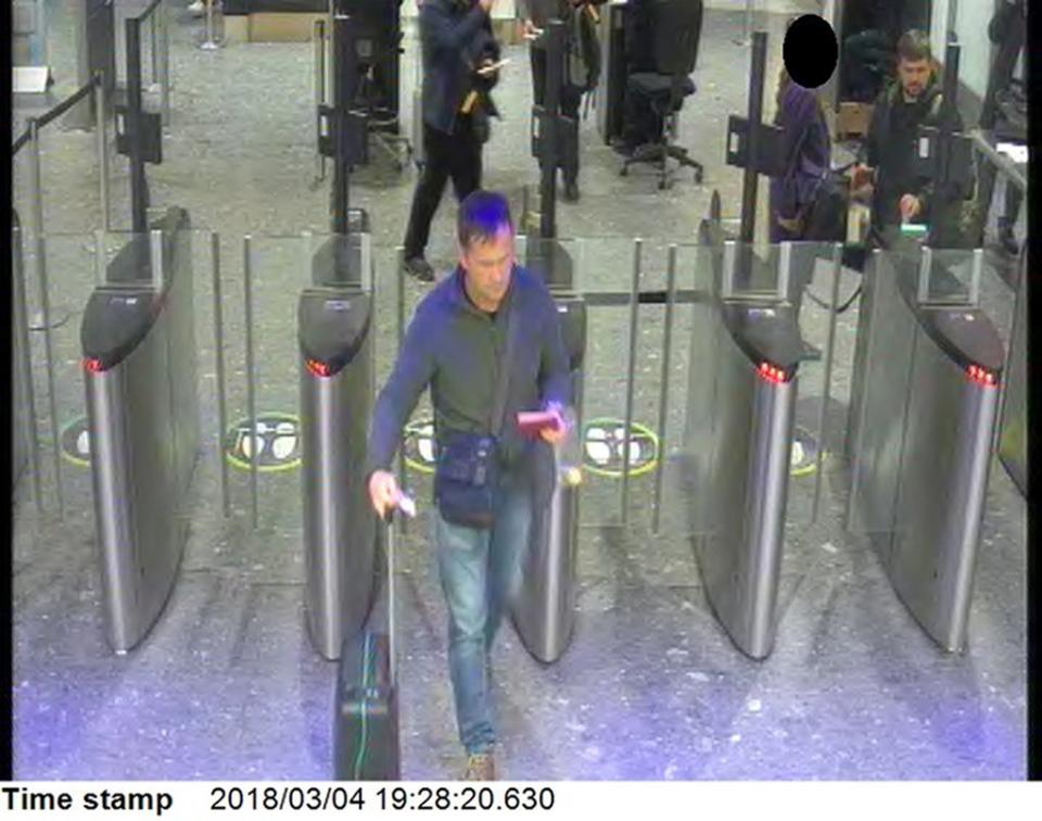 The suspects passing through passport control at London Heathrow at 7.28pm on Sunday evening (4 March) (Metropolitan Police/PA)