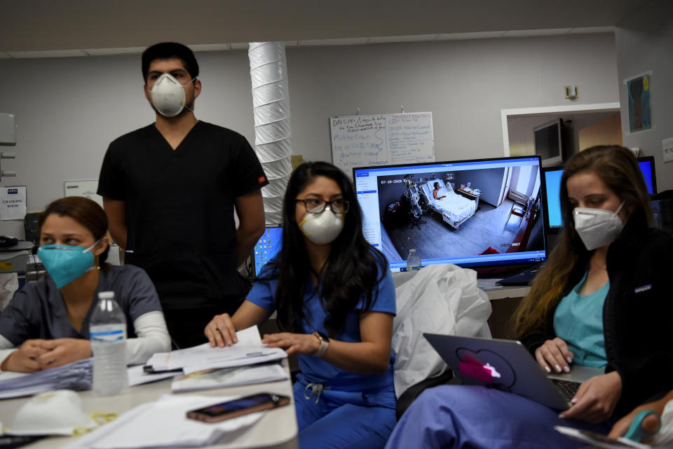 Live camera footage of a patient hospitalised with COVID-19 is shown from a computer monitor during a daily meeting lead by Dr. Joseph Varon (not pictured), the chief medical officer at United Memorial Medical Center (UMMC), with a team of healthcare professionals, during the coronavirus disease (COVID-19) outbreak, in Houston, Texas, U.S., July 10, 2020.  REUTERS/Callaghan O'Hare     SEARCH 