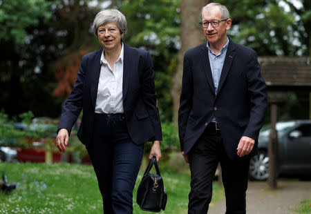 Britain's Prime Minister Theresa May arrives at church with her husband Philip, near High Wycombe, Britain May 26, 2019. REUTERS/Peter Nicholls