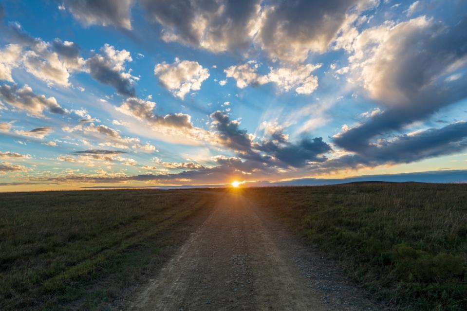 Sun setting at the Tallgrass Prairie National Preserve in Kansas via Getty Images