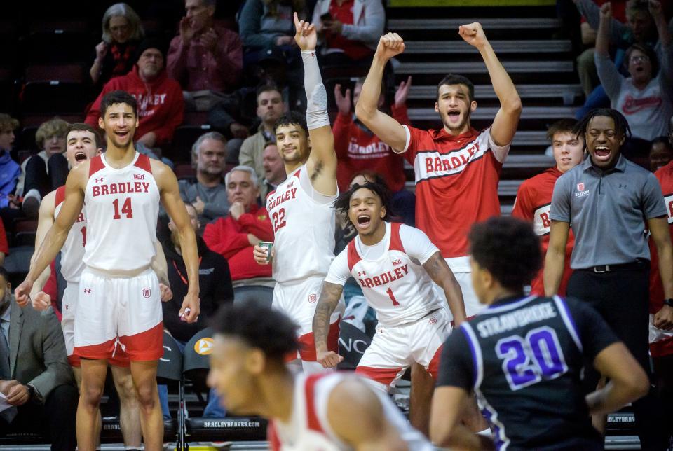 The Bradley bench erupts after a slam dunk against MVC foe Evansville by teammate Zek Montgomery late in the second half Wednesday, Jan. 11, 2023 at Carver Arena. The Braves obliterated the Aces 91-46 for their 17th straight home victory.