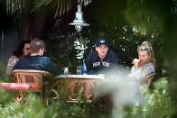 <p>Leonardo DiCaprio having lunch in 1999 with his mom, dad, and step-brother. </p>