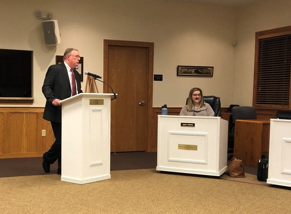 Kevin Wolfe, a loss prevention executive with the Westerville-based private investigations firm WhereWolfe Intelligence, shares the findings of investigation into the Etna Township security camera system during a trustee meeting on Dec. 6.