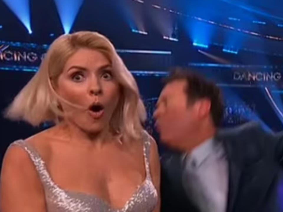 Holly Willoughby reacts to the staged punch (ITV)