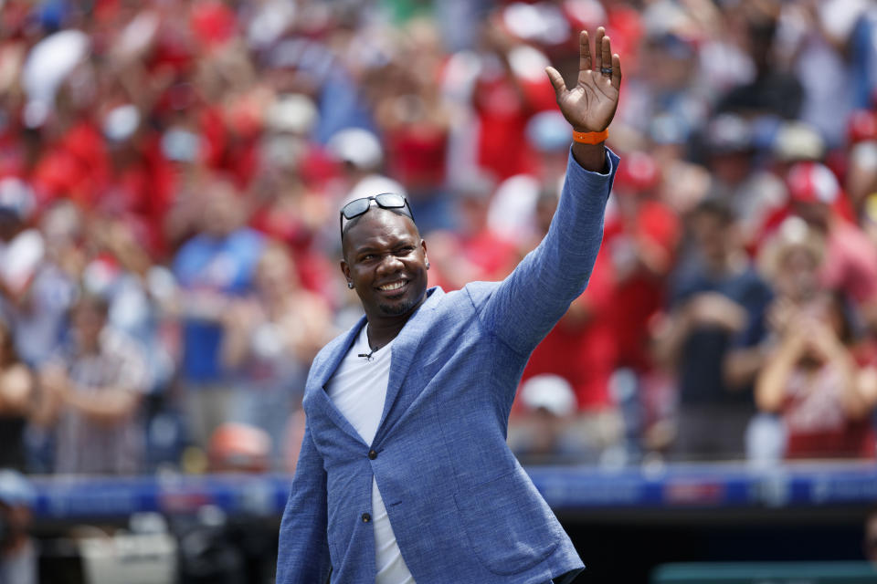 FILE - Former Philadelphia Phillies' Ryan Howard waves to the crowd during a ceremony honoring him before a baseball game between the Philadelphia Phillies and the Washington Nationals, Sunday, July 14, 2019, in Philadelphia. Howard, David Ortiz, Tim Lincecum and Alex Rodriguez are among 13 first-time candidates on the Hall of Fame ballot of the Baseball Writers’ Association of America, joining 17 holdovers. (AP Photo/Matt Slocum, File)