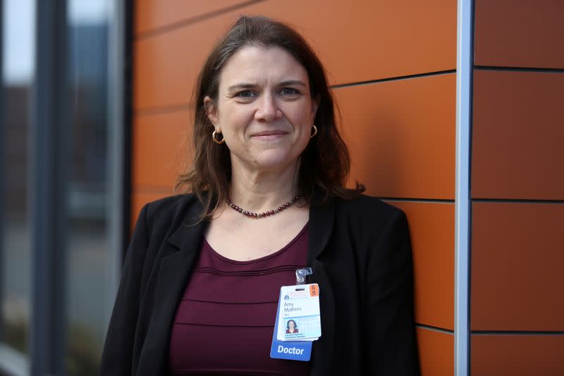 Dr. Amy Mathers stands outside the University of Virginia Medical Center in Charlottesville, Virginia